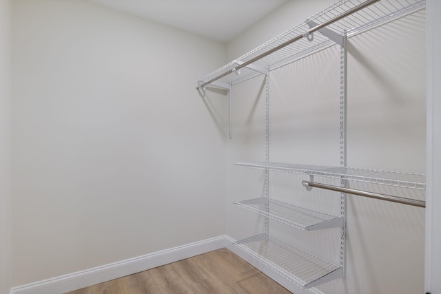 11 Bond St, Hudson, NH 03051 - spacious closet featuring wood finished floors
