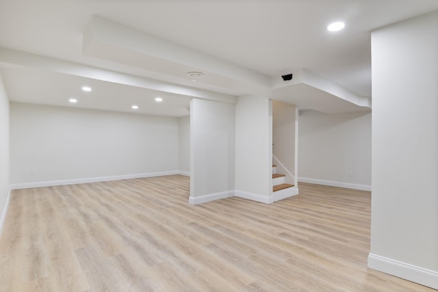 11 Bond St, Hudson, NH 03051 - finished basement with recessed lighting, light wood-style floors, and stairway