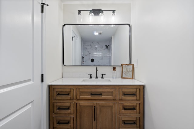 11 Bond St, Hudson, NH 03051 - bathroom with vanity and a marble finish shower
