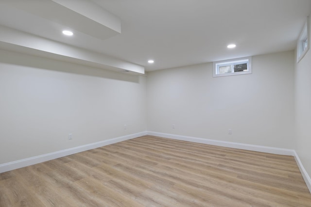 11 Bond St, Hudson, NH 03051 - below grade area with light wood finished floors and recessed lighting