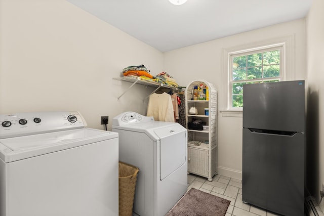 9 Strout Ln, Durham, NH 03824 - washroom featuring washer and dryer and light tile patterned flooring