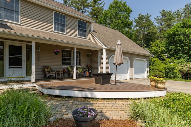 9 Strout Ln, Durham, NH 03824 - porch with an attached garage and driveway