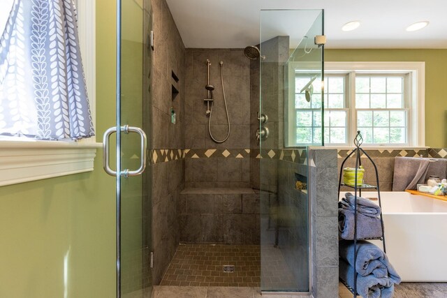 9 Strout Ln, Durham, NH 03824 - bathroom featuring a shower stall and a freestanding bath