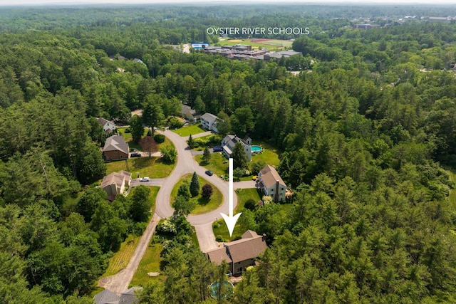 9 Strout Ln, Durham, NH 03824 - aerial view of property and surrounding area featuring a heavily wooded area