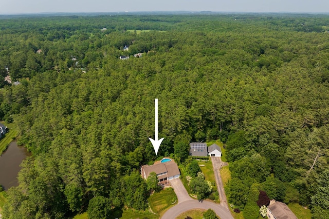 9 Strout Ln, Durham, NH 03824 - aerial view of property and surrounding area featuring a heavily wooded area