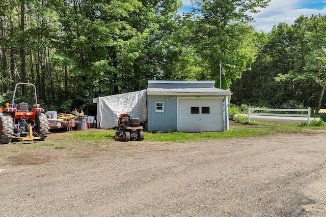 265 Lowell St, Rochester, NH 03867 - view of outdoor structure featuring view of wooded area