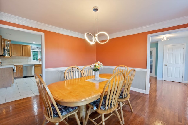 7 Partridge Cir, Salem, NH 03079 - dining room with a chandelier, light wood-style floors, and ornamental molding