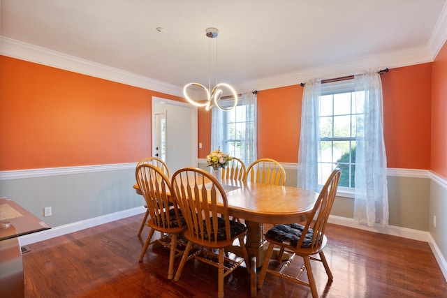 7 Partridge Cir, Salem, NH 03079 - dining space with a chandelier, wood finished floors, and crown molding