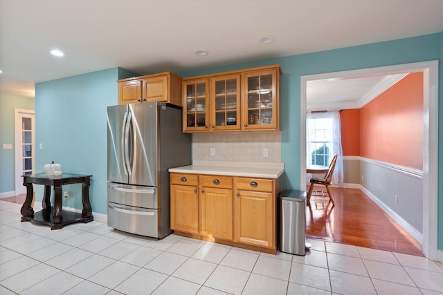 7 Partridge Cir, Salem, NH 03079 - kitchen with freestanding refrigerator, light countertops, glass insert cabinets, tasteful backsplash, and recessed lighting
