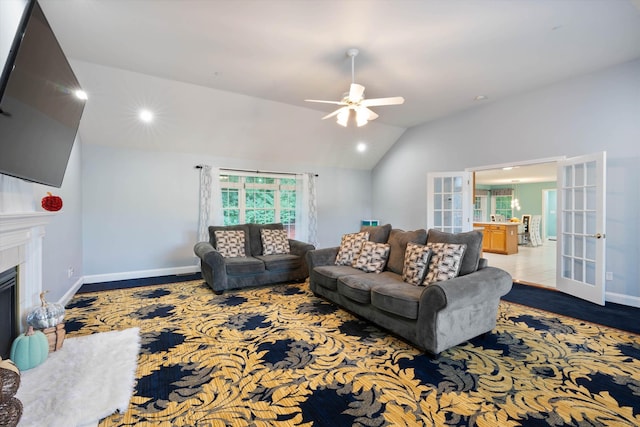 7 Partridge Cir, Salem, NH 03079 - living area with french doors, ceiling fan, a fireplace, recessed lighting, and lofted ceiling