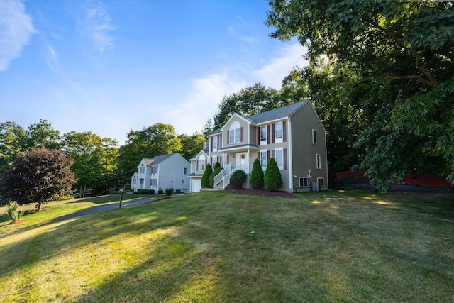 7 Partridge Cir, Salem, NH 03079 - view of front of property with a garage and a front lawn