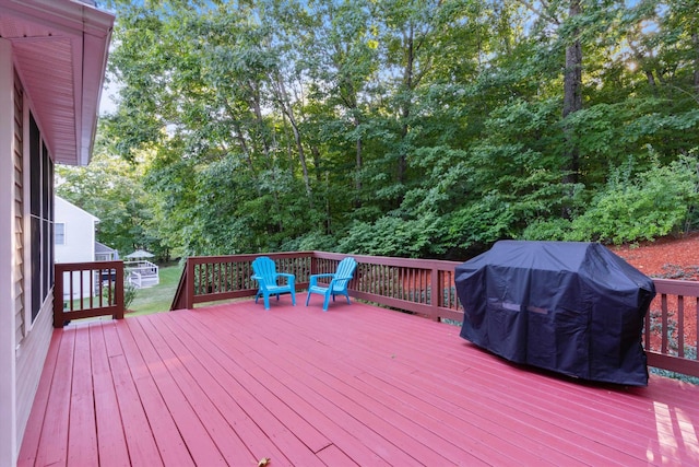 7 Partridge Cir, Salem, NH 03079 - wooden terrace featuring a grill and view of scattered trees