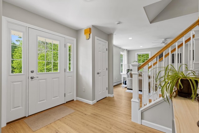 23 Stone Farm Rd, Barrington, NH 03825 - entrance foyer featuring light wood-style flooring, stairs, a baseboard heating unit, recessed lighting, and ceiling fan