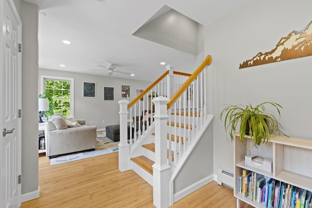 23 Stone Farm Rd, Barrington, NH 03825 - staircase with a baseboard heating unit, wood finished floors, a ceiling fan, and recessed lighting