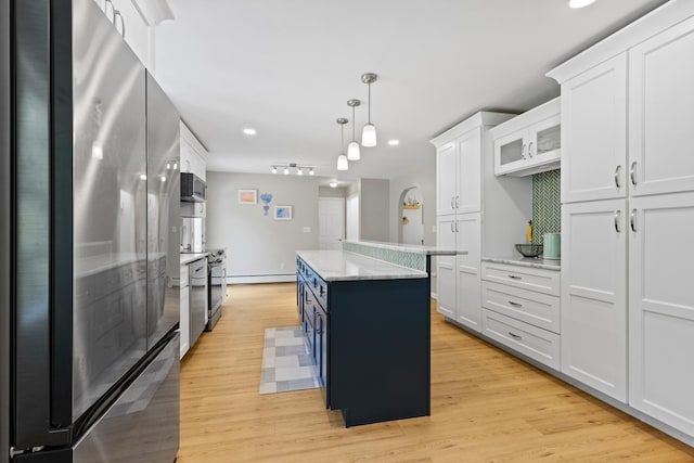 23 Stone Farm Rd, Barrington, NH 03825 - kitchen with appliances with stainless steel finishes, white cabinets, light wood-type flooring, pendant lighting, and recessed lighting
