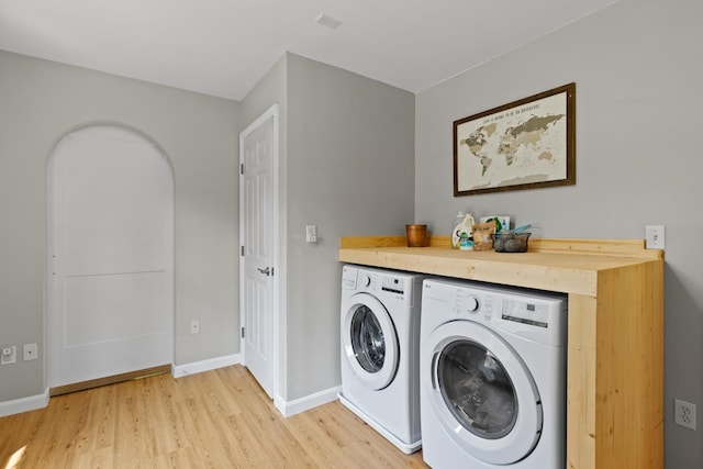 23 Stone Farm Rd, Barrington, NH 03825 - laundry room featuring independent washer and dryer and light wood-style flooring