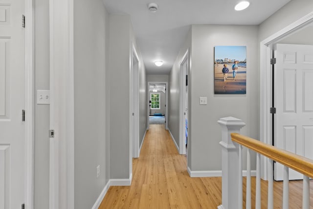 23 Stone Farm Rd, Barrington, NH 03825 - corridor with light wood finished floors and an upstairs landing