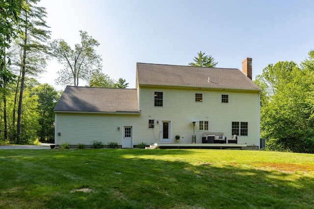 23 Stone Farm Rd, Barrington, NH 03825 - back of house featuring a chimney, a yard, and a deck
