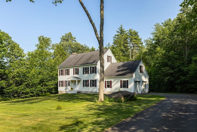 23 Stone Farm Rd, Barrington, NH 03825 - colonial-style house featuring driveway and a front yard