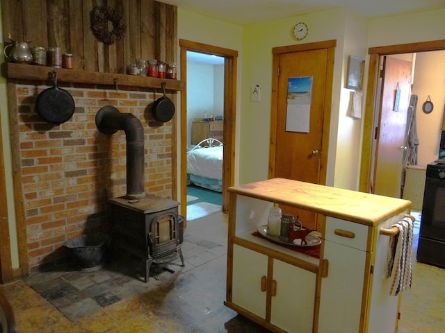 2505 County Rd, Windsor, VT 05089 - kitchen with a wood stove and wood counters