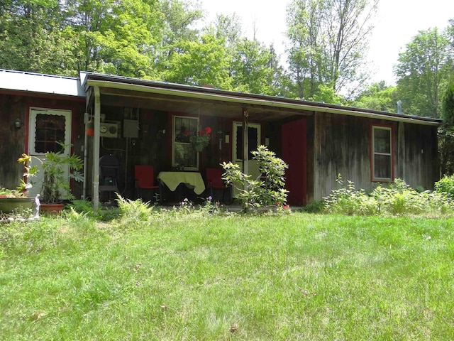 2505 County Rd, Windsor, VT 05089 - rear view of house featuring a lawn
