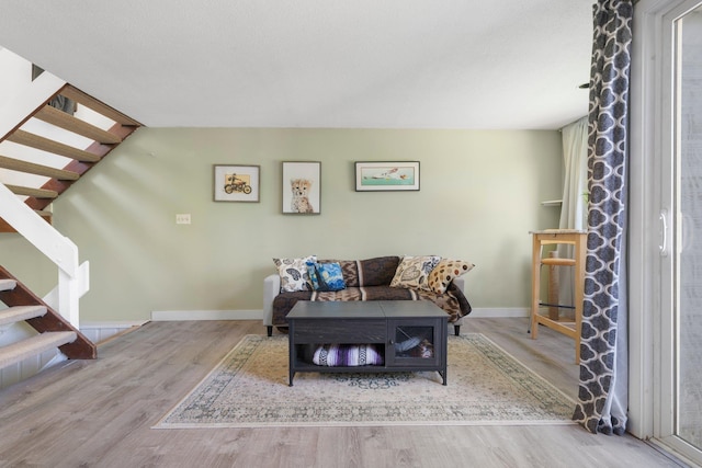 31 Eastside Ln Unit 8, Francestown, NH 03043 - living room with wood finished floors and stairway