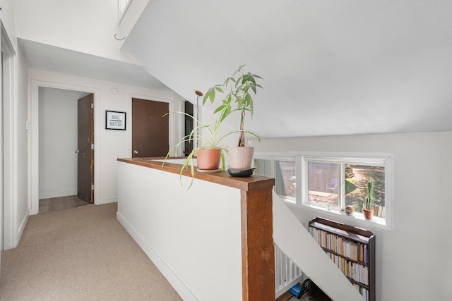 31 Eastside Ln Unit 8, Francestown, NH 03043 - corridor featuring carpet floors and vaulted ceiling