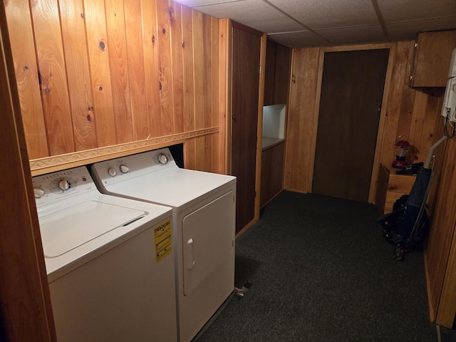 9 Mariette Dr, Portsmouth, NH 03801 - laundry area with separate washer and dryer, wooden walls, and carpet flooring