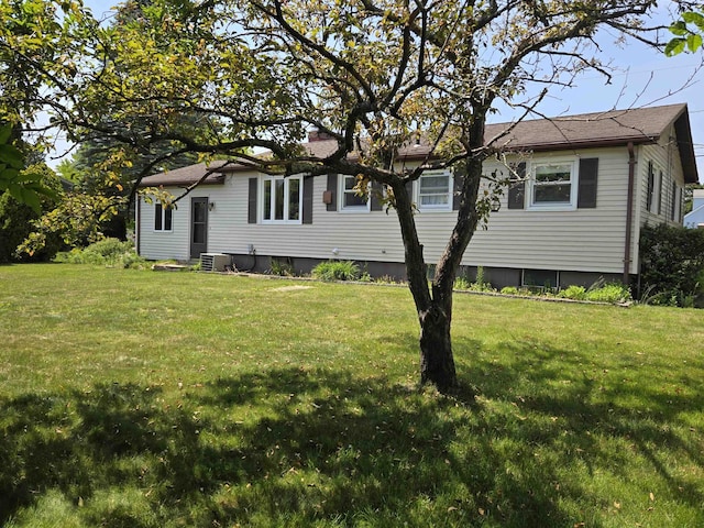 9 Mariette Dr, Portsmouth, NH 03801 - view of front of house with a front yard and a chimney