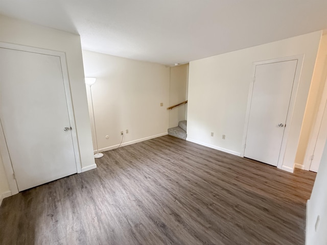 18 Gould Ave Unit 1, Meredith, NH 03253 - spare room with stairs and wood finished floors