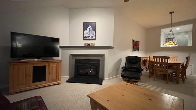 248 Club Sugarbush Ext Unit 18, Warren, VT 05674 - carpeted living area with a fireplace with flush hearth and vaulted ceiling