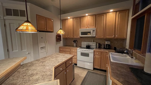 248 Club Sugarbush Ext Unit 18, Warren, VT 05674 - kitchen with white appliances, backsplash, hanging light fixtures, recessed lighting, and light tile patterned flooring