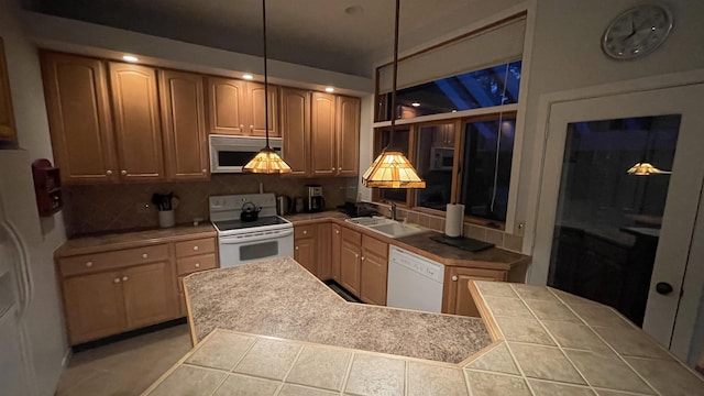 248 Club Sugarbush Ext Unit 18, Warren, VT 05674 - kitchen featuring white appliances, backsplash, tile countertops, and pendant lighting