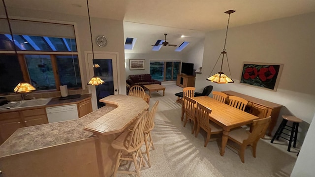 248 Club Sugarbush Ext Unit 18, Warren, VT 05674 - dining area with light carpet, a ceiling fan, and vaulted ceiling