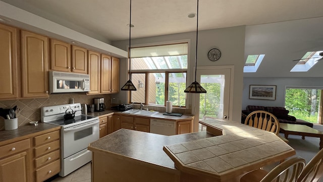 248 Club Sugarbush Ext Unit 18, Warren, VT 05674 - kitchen featuring white appliances, a skylight, backsplash, and light brown cabinetry