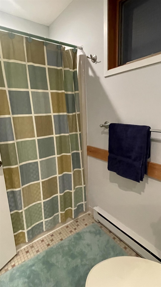 248 Club Sugarbush Ext Unit 18, Warren, VT 05674 - full bath featuring a baseboard heating unit and curtained shower