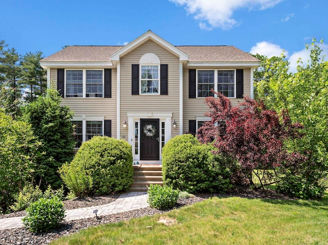 20 Lawrence Rd, Derry, NH 03038 - colonial-style house with a front yard and a shingled roof