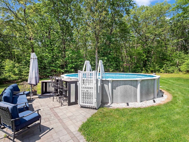 20 Lawrence Rd, Derry, NH 03038 - outdoor pool featuring a lawn and a patio