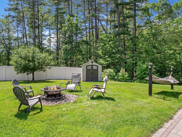 20 Lawrence Rd, Derry, NH 03038 - view of yard featuring an outdoor fire pit and a storage unit