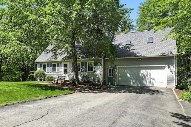20 Edward Dr, Concord, NH 03301 - cape cod house with driveway, roof with shingles, and a front lawn