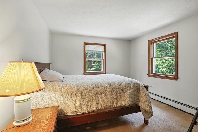20 Edward Dr, Concord, NH 03301 - carpeted bedroom featuring a baseboard radiator