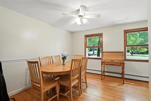20 Edward Dr, Concord, NH 03301 - dining area with a baseboard heating unit, light wood-style flooring, and ceiling fan