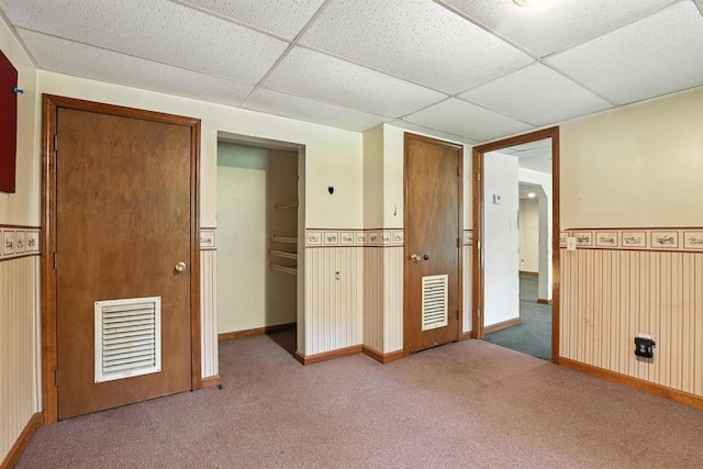 20 Edward Dr, Concord, NH 03301 - unfurnished bedroom featuring carpet flooring, a drop ceiling, a closet, and wainscoting
