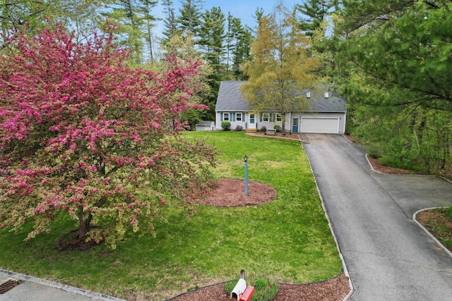 20 Edward Dr, Concord, NH 03301 - view of front of home featuring a garage, asphalt driveway, and a front yard