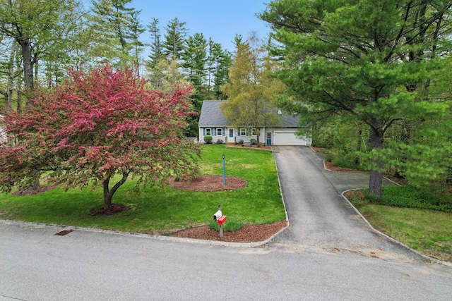 20 Edward Dr, Concord, NH 03301 - view of front facade with an attached garage, driveway, and a front lawn