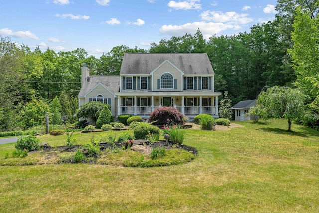 60 Lady Slipper Ln, Chester, NH 03036 - colonial home with covered porch, a front yard, and a chimney