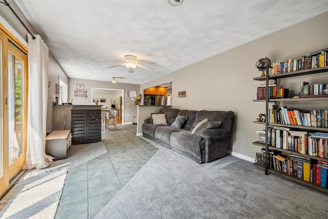 19 Hardwood Rd, Windham, NH 03087 - tiled living area with ceiling fan and baseboards
