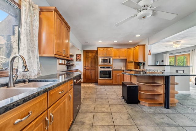 19 Hardwood Rd, Windham, NH 03087 - kitchen featuring appliances with stainless steel finishes, open shelves, ceiling fan, recessed lighting, and dark stone countertops