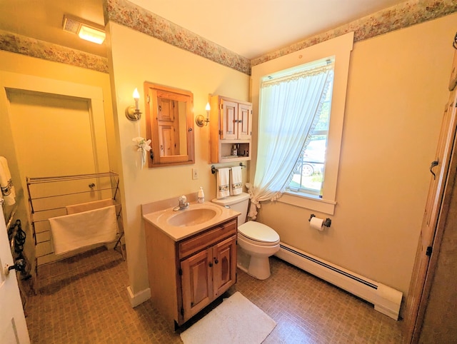 1573 US Route 5 S, Barnet, VT 05821 - full bath with a baseboard heating unit and vanity