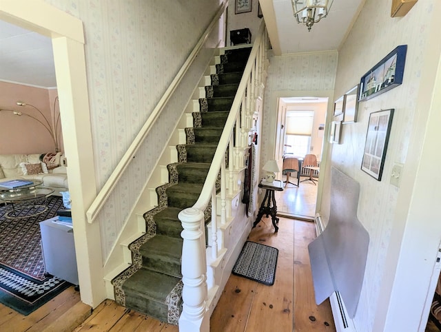 1573 US Route 5 S, Barnet, VT 05821 - staircase featuring wallpapered walls, wood-type flooring, and crown molding
